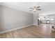 Open living room and kitchen with hardwood floors and modern finishes at 98 Linda St, Princeton, NC 27569