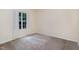 Spacious bedroom with neutral carpeting and large window at 140 Applegate Dr, Franklinton, NC 27525