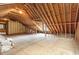 Unfinished attic area offering ample storage or expansion possibilities at 140 Applegate Dr, Franklinton, NC 27525