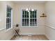 Bright dining area with large windows and a chandelier at 140 Applegate Dr, Franklinton, NC 27525