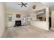 Living room with a fireplace and access to the backyard at 140 Applegate Dr, Franklinton, NC 27525