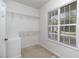 Walk-in closet with wire shelving and window at 140 Applegate Dr, Franklinton, NC 27525