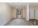 Bright dining room with neutral carpeting, chandelier, and view of backyard at 140 Applegate Dr, Franklinton, NC 27525
