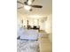 Open living and dining area with hardwood floors, neutral decor, and comfy sofas at 509 Hallie Long Ln, Burlington, NC 27217