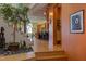 Open concept living space with hardwood floors and unique artwork at 103 W Main St # 405, Durham, NC 27701