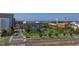 Aerial view of city neighborhood with streets and rail line at 103 W Main St # 405, Durham, NC 27701