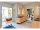 Spa-like bathroom with double vanity and a view of bedroom at 103 W Main St # 405, Durham, NC 27701