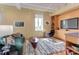 Living room with large windows and a comfortable seating area at 103 W Main St # 405, Durham, NC 27701