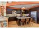 Modern kitchen with dark cabinetry, stainless steel appliances and hardwood floors at 103 W Main St # 405, Durham, NC 27701