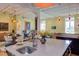 Open concept kitchen with island and stainless steel sink, perfect for entertaining at 103 W Main St # 405, Durham, NC 27701