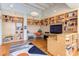 Bright home office with built-in shelves and a workspace at 103 W Main St # 405, Durham, NC 27701