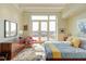 Main bedroom with hardwood floors and city views at 103 W Main St # 405, Durham, NC 27701