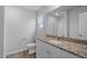 Bathroom with granite countertop vanity and a shower/tub combo at 820 Rhino Bnd, Oxford, NC 27565