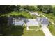 Aerial view of lot with partial demolition and existing garage at 1304 Shade Tree Rd, Benson, NC 27504