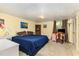 Relaxing bedroom with a large bed and home office space at 9500 Ligon Mill Rd, Wake Forest, NC 27587