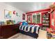 Charming bedroom with a striped bed and built-in shelving at 9500 Ligon Mill Rd, Wake Forest, NC 27587
