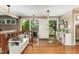Bright entryway with hardwood floors and bench at 9500 Ligon Mill Rd, Wake Forest, NC 27587