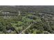 Aerial view showing a secluded wooded lot near residential area at 9500 Ligon Mill Rd, Wake Forest, NC 27587