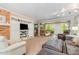 Open living room with brick fireplace at 9500 Ligon Mill Rd, Wake Forest, NC 27587