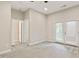 Spacious bedroom with French doors leading outside at 622 Chronicle Dr, Cary, NC 27513