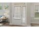 White front door with sidelights and blinds, offering natural light and privacy at 622 Chronicle Dr, Cary, NC 27513