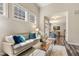 Spacious living room showcasing hardwood floors and a view into the dining area at 622 Chronicle Dr, Cary, NC 27513