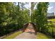 Wooden boardwalk path through a wooded community area at 622 Chronicle Dr, Cary, NC 27513