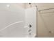 Clean bathroom with shower/tub combo and dark vanity at 622 Chronicle Dr, Cary, NC 27513