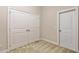 Spacious closet with double doors and neutral carpeting at 622 Chronicle Dr, Cary, NC 27513