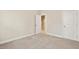 Bright bedroom with carpet and access to hallway at 622 Chronicle Dr, Cary, NC 27513