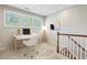 Virtually staged home office with a desk, chair, and built-in shelves at 622 Chronicle Dr, Cary, NC 27513
