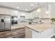Modern kitchen with stainless steel appliances and granite countertops at 622 Chronicle Dr, Cary, NC 27513
