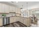 Eat-in kitchen with granite countertops and stainless steel appliances at 622 Chronicle Dr, Cary, NC 27513