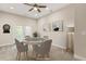 Virtually staged game room with French doors and game table at 622 Chronicle Dr, Cary, NC 27513