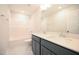 Bathroom with double vanity and a shower/tub combo at 315 Tobacco Barn Dr, Angier, NC 27501