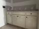 White bathroom vanity with quartz countertop at 42 Yellow Sun Pl, Zebulon, NC 27597