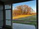 Screened porch overlooking a grassy backyard at 952 Olive Branch Dr, Smithfield, NC 27577