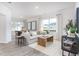 Bright living room with a neutral color scheme and large windows at 2833 Egert Dr, Haw River, NC 27258