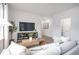 Spacious living room with a neutral color palette and large windows at 2833 Egert Dr, Haw River, NC 27258