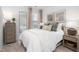 Bright bedroom with a comfortable bed, nightstands, and dresser at 2833 Egert Dr, Haw River, NC 27258