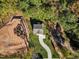 New construction home nestled in wooded lot with driveway at 900 Sw Maynard Rd, Cary, NC 27511