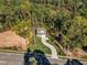 New house on a wooded lot with a long driveway at 900 Sw Maynard Rd, Cary, NC 27511