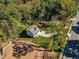 Aerial view of a new construction home with a large lot and driveway at 900 Sw Maynard Rd, Cary, NC 27511