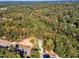 Aerial view of a house and surrounding area, showcasing its location and neighborhood at 900 Sw Maynard Rd, Cary, NC 27511