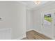 Bright foyer with hardwood floors and access to other rooms at 900 Sw Maynard Rd, Cary, NC 27511