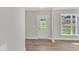 Bright foyer with hardwood floors and access to other rooms at 900 Sw Maynard Rd, Cary, NC 27511