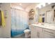 Clean bathroom with a shower/tub combo and white vanity at 312 Sustainable Way, Raleigh, NC 27610