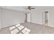 Bright bedroom with carpet flooring and ceiling fan at 900 Sw Maynard Rd, Cary, NC 27511