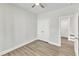 Spacious bedroom with double doors leading to a large closet and another room at 900 Sw Maynard Rd, Cary, NC 27511