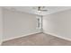 Bright bedroom with carpet flooring and ceiling fan at 900 Sw Maynard Rd, Cary, NC 27511